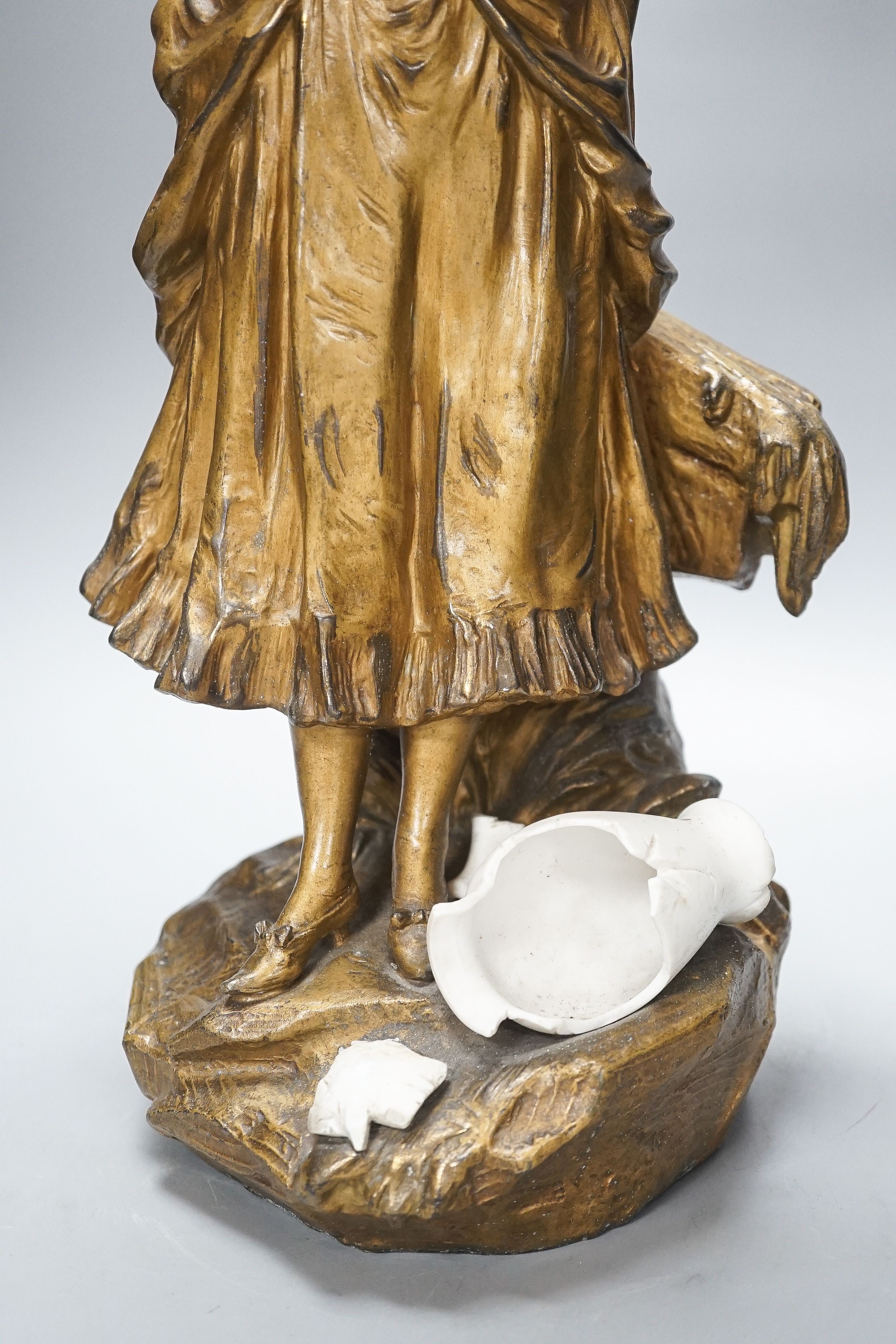 A late 19th Century French gilt spelter and bisque porcelain figure after Mednat 54cm